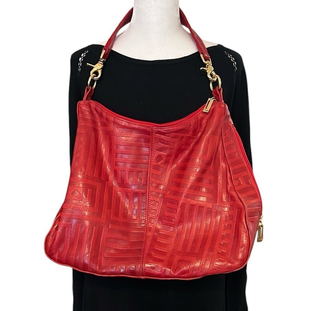 Unbranded red leather handbag minimal wear outside some staining inside  EUC